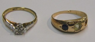 A lady's 18ct gold dress ring set a diamond and 1 other gold dress ring