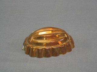 A 20th Century oval copper jelly mould 6 1/2"