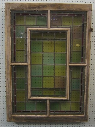 A 1930's stained glass window panel 33" x 24"
