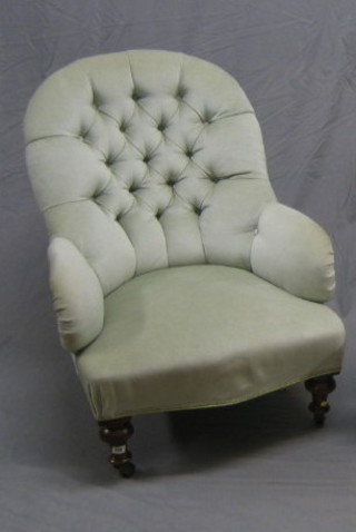 A Victorian mahogany framed tub back armchair upholstered in turquoise buttoned back Dralon