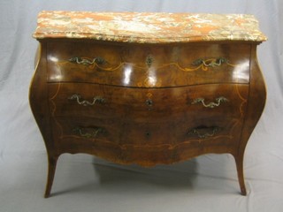 A handsome 19th/20th Century French Kingwood commode of bome form, with pink veined marble top, inlaid throughout and fitted 3 long drawers, raised on cabriole supports, 51"