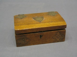 An Edwardian rectangular oak box with hinged lid decorated The Arms of the Salters Company? 8"