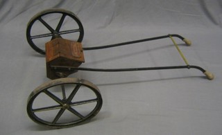 A 19th Century iron and wooden seed drill by R & J Reeves & Sons Ltd