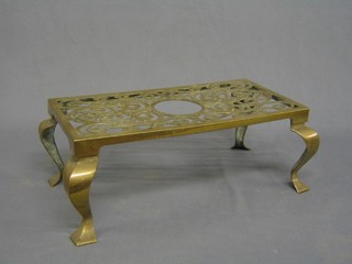 A rectangular pierced brass trivet, 15"