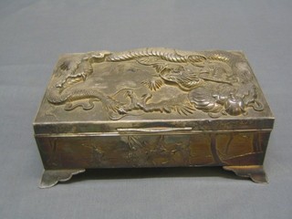 A rectangular antimony box decorated a dragon with hinged lid 9" 