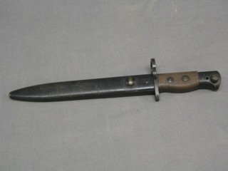 A 1950's bayonet complete with metal scabbard