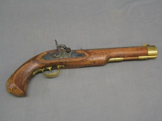 A 20th Century black powder percussion pistol by Kentucky, the barrel marked Spain Kentucky