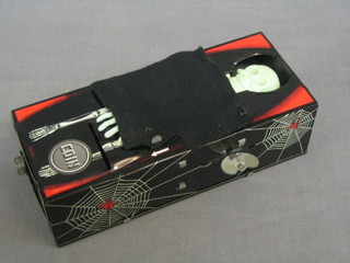 A tin plate model "The Coffin Money Box", boxed