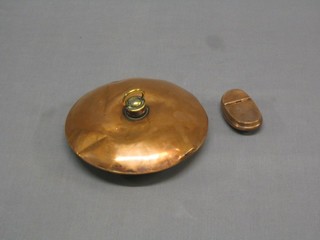 A 19th Century oval copper tobacco box 3" together with a circular copper foot warmer