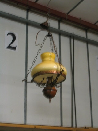 A reproduction wooded and metal light fitting in the form of a 19th Century hanging oil lamp