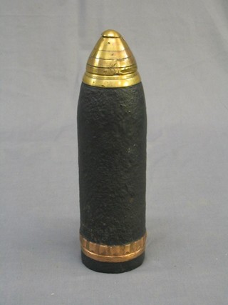 A WWI iron and brass shell