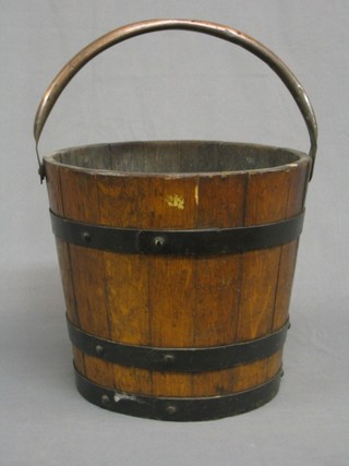 An oak coopered bucket with copper swing handle, 11"