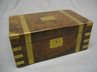 A Victorian rectangular figured walnut and brass banded writing slope with hinged lid 16"