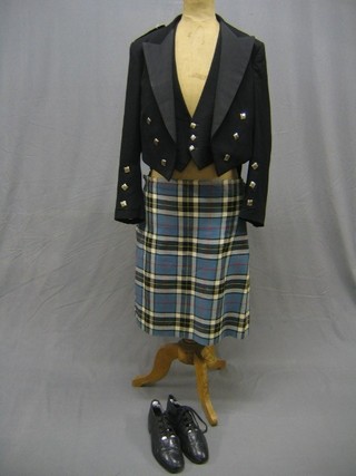 A 4 piece Highland rig by Highland Industries comprising jacket, waistcoat, kilt and shoes