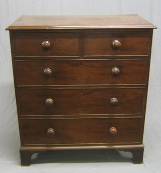 A Victorian mahogany D shaped chest of 2 short and 3 long drawers with tore handles, raised on bracket feet 39"