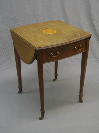 An Edwardian oval drop flap table with crossbanded and satinwood top, fitted a drawer raised on square tapering supports ending in splayed feet 22"