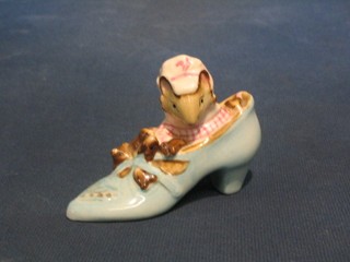 A Beswick Beatrix Potter figure (brown mark to base) The Old Woman Who Lived in a Shoe