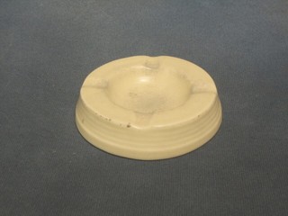 A Wedgwood Keith Murray ashtray, the base marked Keith Murray Wedgwood Made In England 11K34, (some staining and small chips to base and rim)