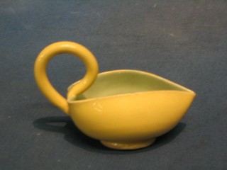 A 19th Century Oriental Celadon and yellow glazed "oil" boat, 4" (slight chip to rim)
