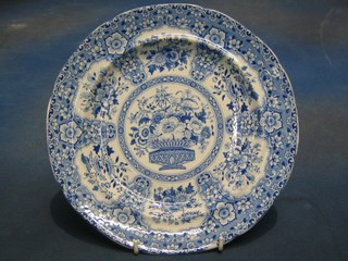 A pair of Semi Nankin blue and white china plates with  floral decoration 10" (1 chipped and cracked)