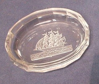 A Baccarat clear glass ashtray decorated a galleon 4" (some chips to edge) 4" 