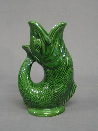 A Dartmouth pottery green glazed gurgling fish jug 9"