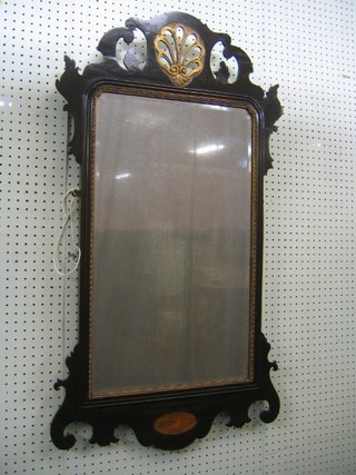 A Chippendale style plate mirror contained in a rectangular mahogany pierced shape frame 40"