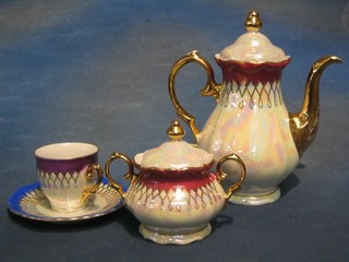 A 1950's 8 piece Continental lustre pattern coffee service comprising coffee pot, lidded sucrier, 6 cups and 6 saucers all with colourful banding together with an etched glass finger bowl (slight chip to rim)