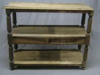 A William IV mahogany 3 tier dumb waiter, fitted 2 drawers, raised on turned and reeded supports 53" (barn condition)