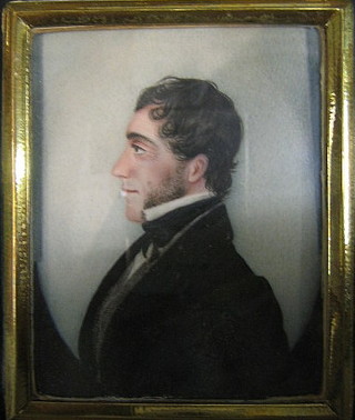 A 19th Century portrait on ivory of a seated gentleman with moustache 3 1/2" x 3" contained in an ebonised frame