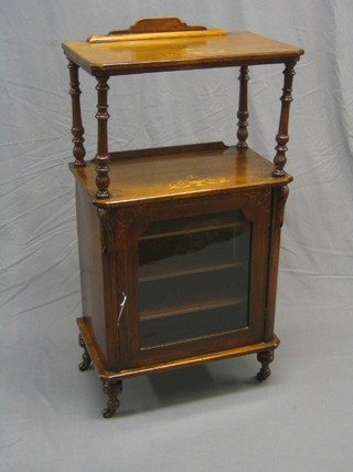 A  Victorian inlaid walnut music cabinet with raised top and recess, the interior fitted shelves enclosed by a glazed panelled door 22" 