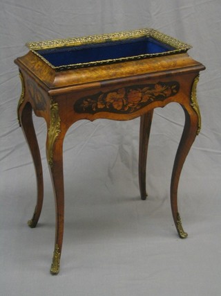 A Victorian rectangular inlaid Kingwood jardiniere with pierced brass gallery, raised on French cabriole supports with gilt metal mounts 24"