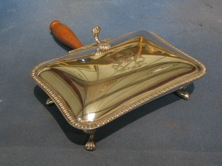 A rectangular silver plated table top cigarette box with turned wooden handle, raised on cabriole supports 8"