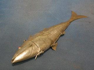 An Eastern white metal  trinket box in the form of an articulated fish with coral eyes, 15"
