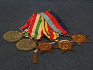 A group of 5 medals comprising 1939-45 Star, Africa Star with bar First Army, Italy Star, Defence and War medal together with original cardboard box