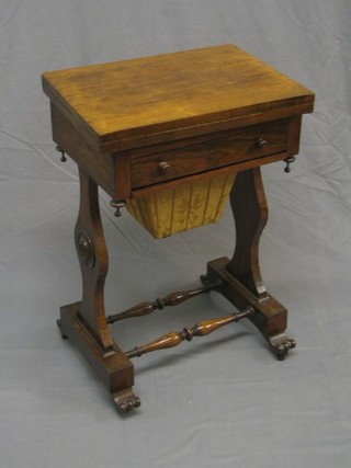 A William IV mahogany tilt top work table, the interior inlaid a chessboard, backgammon and cribbage board, fitted 1 long drawer above a deep basket, raised on standard end supports united by a turned H framed stretcher 20"
