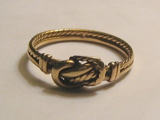A 19th Century gilt metal knot ring