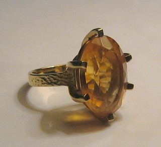 A lady's 18ct gold dress ring set an oval cut citrene