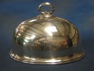 An oval silver plated meat cover 12"