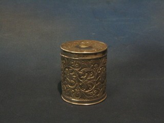 An Eastern cylindrical embossed silver box and cover, 3"