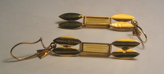 A pair of 18ct gold earrings set citrene