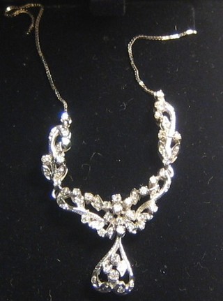 A lady's 18ct white gold necklace set diamonds