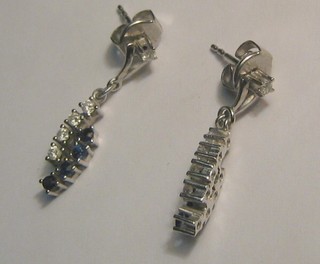 A pair of lady's 18ct white gold earrings set 4 diamonds and 4 sapphires