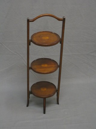 An inlaid mahogany 3 tier folding cake stand