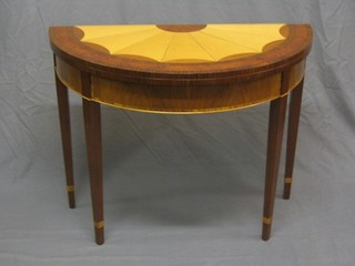 A Sheraton style walnut and crossbanded tea table, raised on square tapering supports 36"