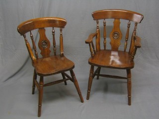 A set of 8 20th Century elm Windsor stick and bar back dining chairs (2 carvers, 6 standard)