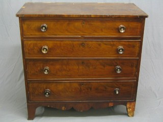 A 19th Century mahogany and crossbanded "Channel Islands" chest, the top inlaid satinwood stringing and crossbanding, fitted 4 long graduated drawers with tore handles set mother of pearl, raised on bracket feet (loss of crossbanding to the top and veneer to the apron and right hand bracket foot, handle f) 43"