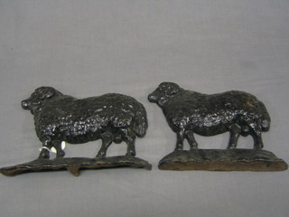 A pair of 19th Century iron door stops in the form of  rams