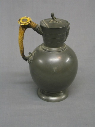 A pewter hotwater jug with stag horn handle by James Dixon & Sons 10"