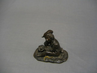 A bronze figure of a resting gardener, raised on an oval base 7" (possibly part of a clock set)